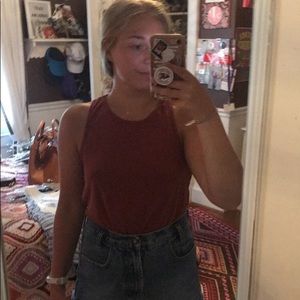 A burgundy tank top